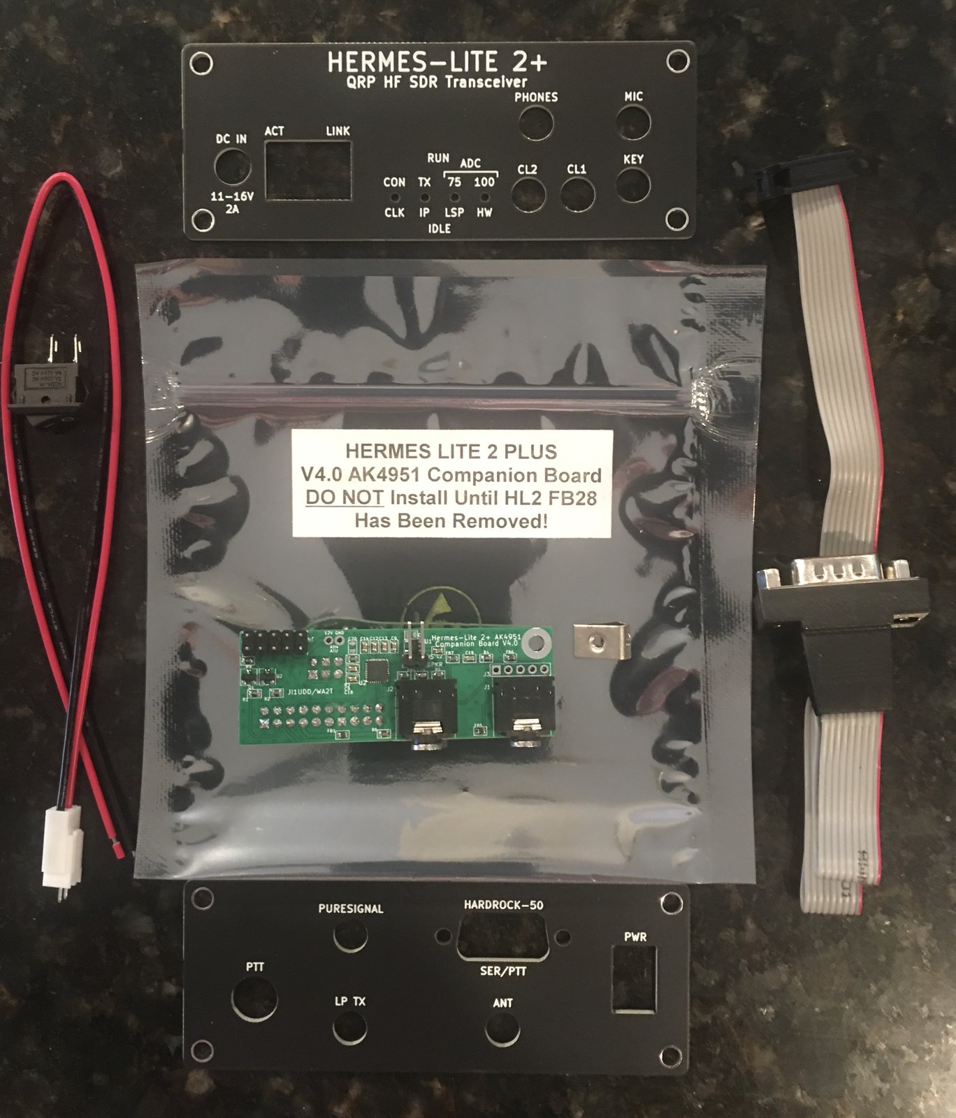 The contents of the AK4951 companion board kit laid out